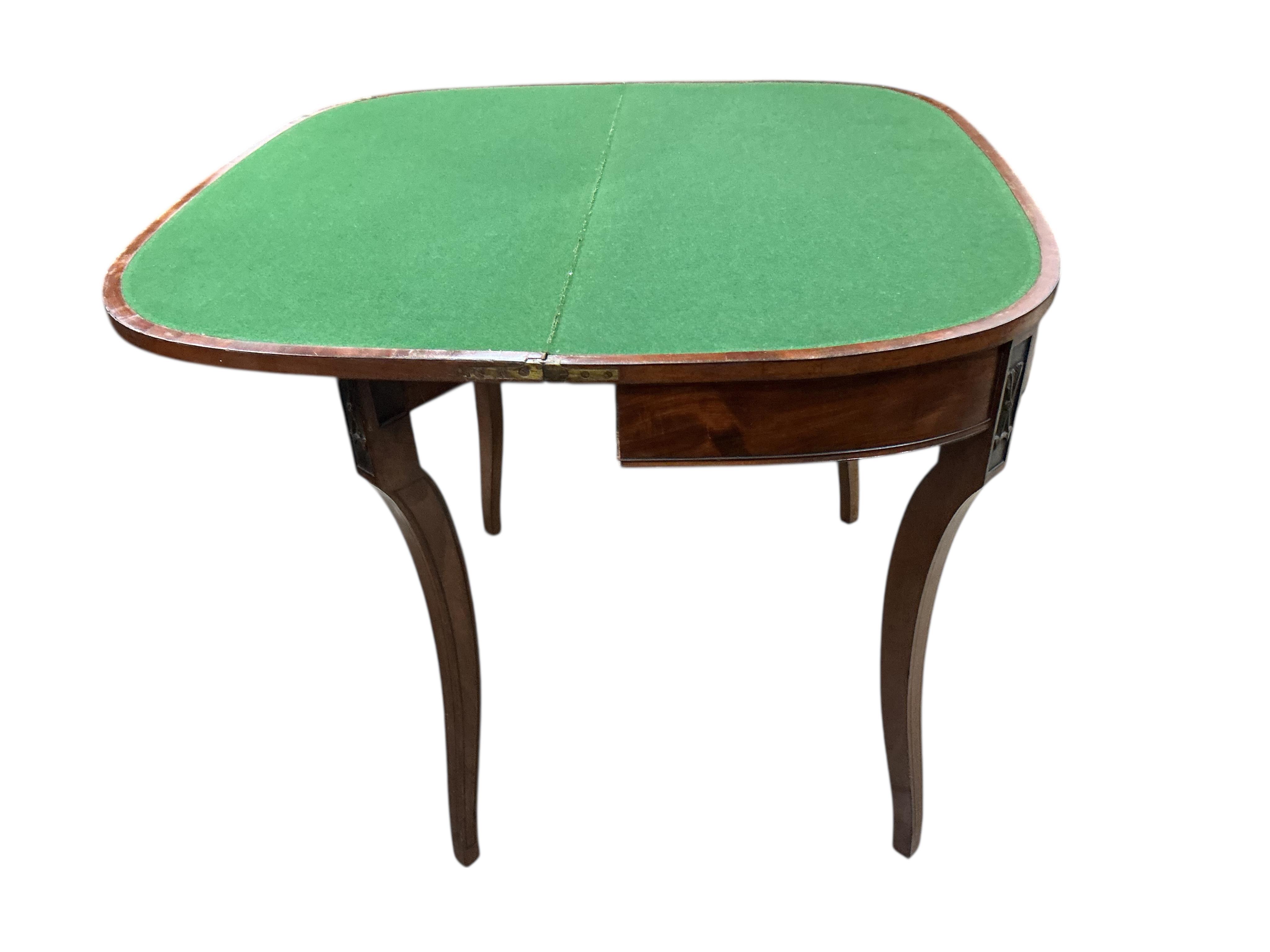 A Regency mahogany D shaped folding card table, width 92cm, depth 45cm, height 74cm